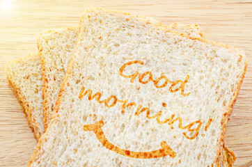 Good morning greeting on toasted bread wheat.