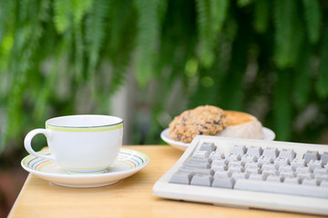 cup of coffee with brad cookie