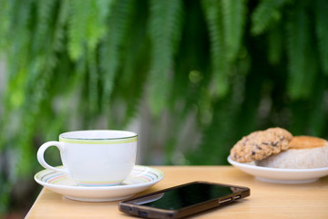 cup of coffee with brad cookie