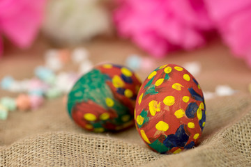 painted egg on burlap