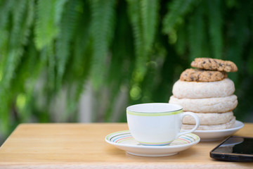 cup of coffee with brad cookie