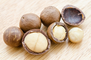 Macadamia nut on wooden.