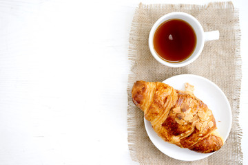 croissant cup coffee white  table