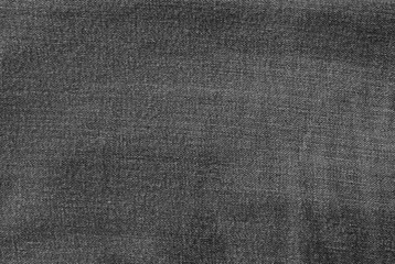 Fototapeta na wymiar Background Pattern of Black Denim Jean Texture