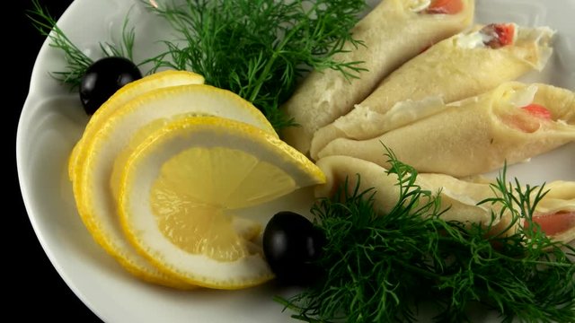 Pancakes with smoked salmon and butter, loop
