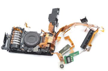 Disassembled digital camera with exposed lens