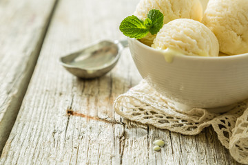 Vanilla ice cream in white bowl