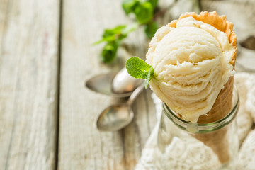 Vanilla ice cream in waffle cone