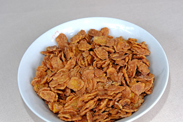 Cornflakes chocolate in a white bowl