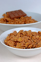 Cornflakes chocolate in a white bowl