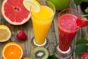 Healthy fruit smoothies, strawberry, grapefruit, orange, kiwi, apple and lemon