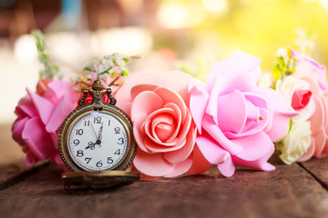 Vintage pocket watch with rose bouquet