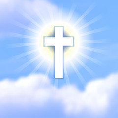 Cross in blue cloudy heaven. The symbol of Christ's resurrection