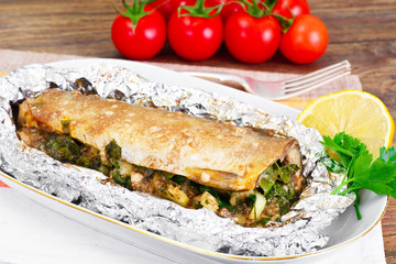 Mackerel Stuffed with Celery and Parsley in a Sauce of Coconut M