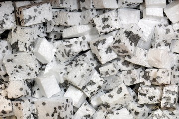 Texture of black and white polystyrene foam cubes.