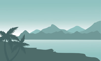 Silhouette of beach and mountain