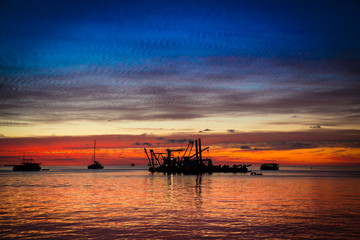 Crimson sunset over the sea . Maldives