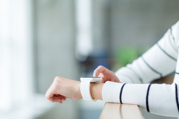 Woman use of wearable smartwatch