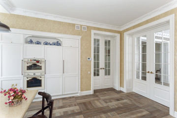 Obraz premium White kitchen interior and close door