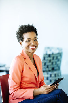 Black Businesswoman Using Digital Tablet