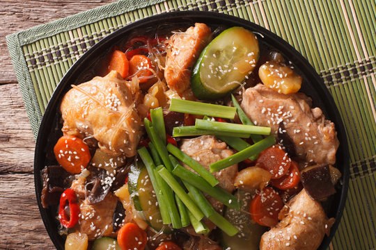 Dakjim braised chicken with vegetables in a Korean style close-up. horizontal top view
