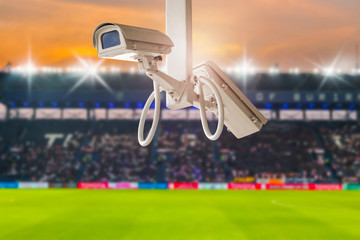CCTV security in stadium football at twilight background.
