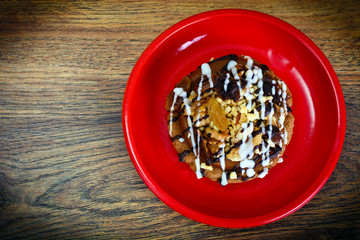 Homemade Cakes: Cake on Plate with Nuts, Chocolate and Raisins
