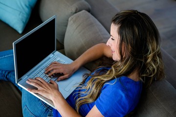 smiling business woman on a laptop