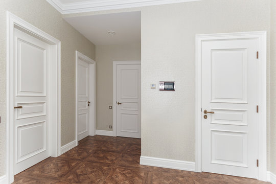 corridor with four door.
