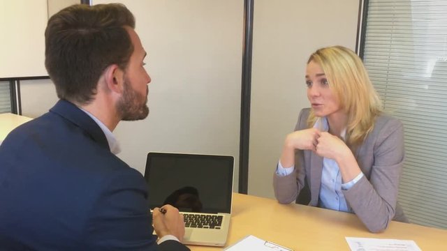 View of a Young attractive woman during job interview