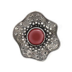 brooch with red stone isolated on white