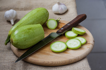 Cut zucchini on chopping board