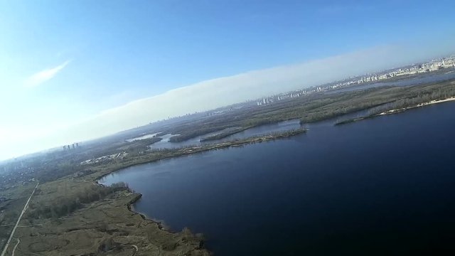 Spring landscape with lake, river from height. Aerial with lists