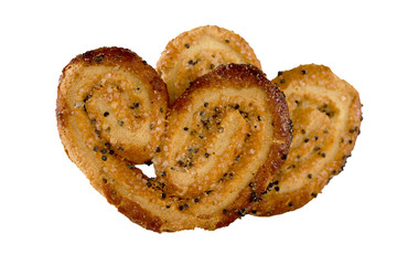 cookies of puff pastry sprinkled with poppy seeds