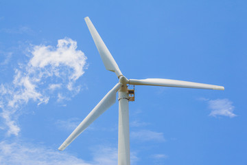 view of windturbine producing alternative energy with a clear blue sky horizontal
