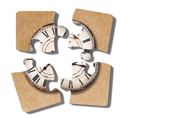 Old-fashioned clock print on puzzle pieces