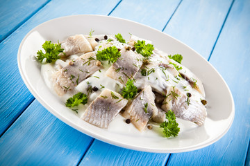 Marinated herring fillets in cream
