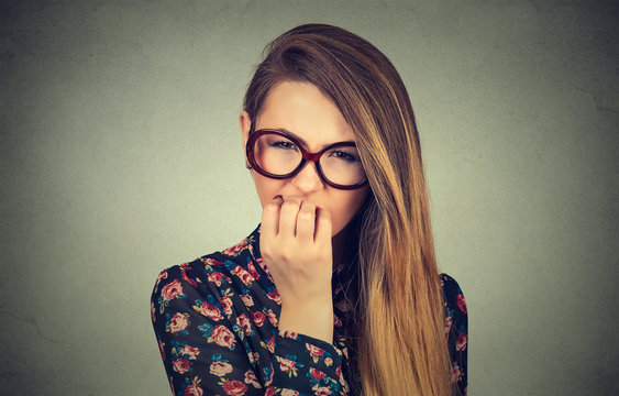 Portrait Of Worried Woman In Glasses