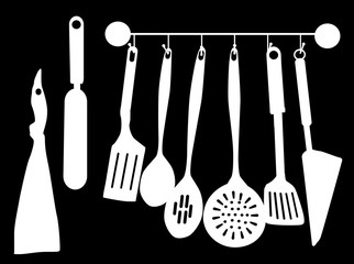 eight white kitchen utensil on black