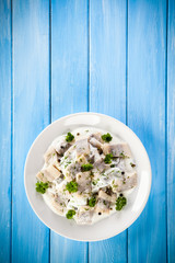 Marinated herring fillets in cream