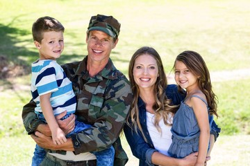 Soldier reunited with his family in the park