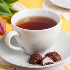 A Cup of Tea with Easter Egg Shaped Chocolate Candies