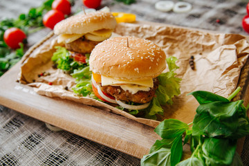 homemade burger on a wooden board