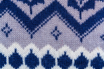 background of wool with white, gray, blue geometric patterns