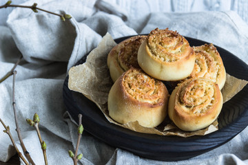Cinnamon rolls in wooden plate