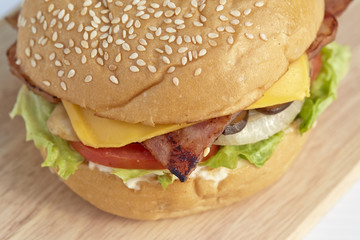 Burger with bacon isolated