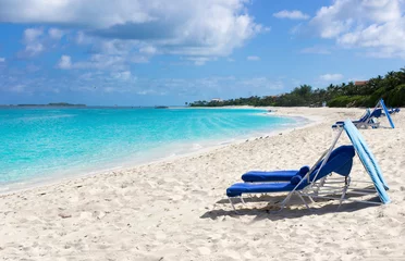 Keuken foto achterwand Seven Mile Beach, Grand Cayman recliner for spa treatment on the beach