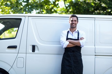 Portrait of confident delivery man