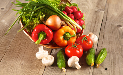 Vegetables . Fresh Bio Vegetable in a Basket. Over Nature Background