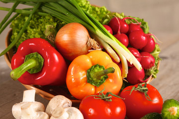 Vegetables . Fresh Bio Vegetable in a Basket. Over Nature Background